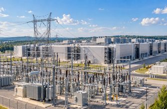 Large American data center and electrical substation illustrating the PJM data center power cuts debate.